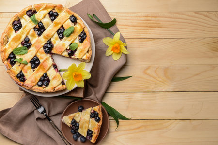 Tasty blueberry pie on wooden tableの写真素材