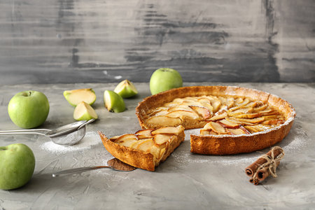 Tasty apple pie on grunge backgroundの写真素材