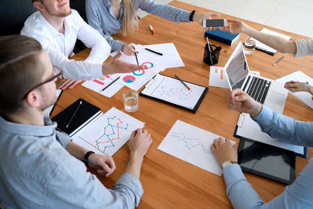 Group of young people at business meeting in officeの写真素材