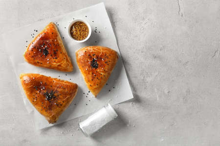 Tasty samosas on grunge background