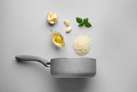Raw ingredients for risotto on light backgroundの写真素材