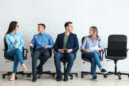 Young people waiting for job interview indoors