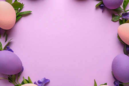 Beautiful Easter eggs on color backgroundの写真素材