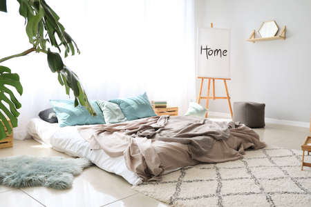 Stylish interior of modern bedroom
