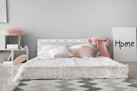 Stylish interior of modern bedroom