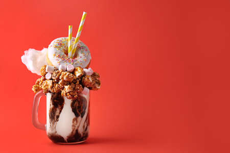 Delicious freak shake on color backgroundの写真素材