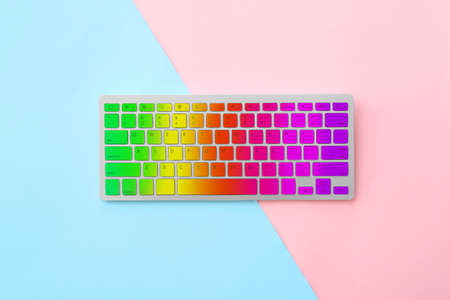 Colorful computer keyboard on color backgroundの写真素材