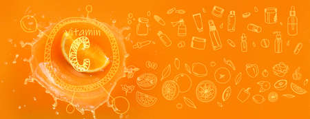 Falling of orange piece into juice, top viewの写真素材