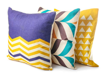 Soft color pillows on white background