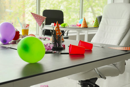 Table with trash in office after partyの写真素材