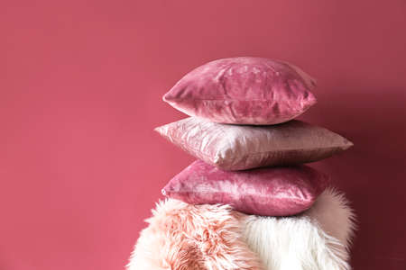 Soft pillows on color backgroundの写真素材