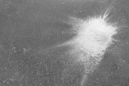 Fresh flour on gray backgroundの写真素材