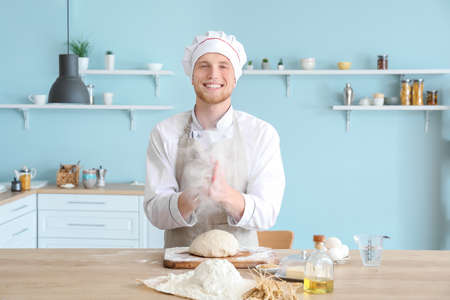 Chef making dough in kitchen
