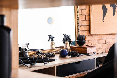 Hairdresser tools on table in beauty salonの写真素材