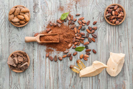 Different cocoa products on wooden backgroundの写真素材