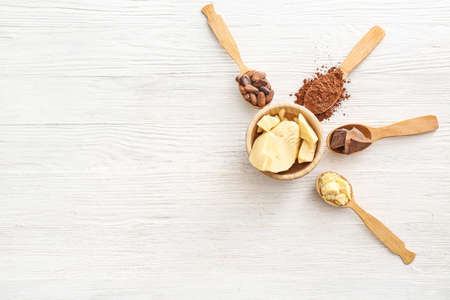 Different cocoa products on white wooden backgroundの写真素材