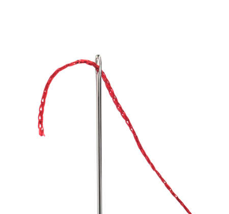 Needle with sewing thread on white background