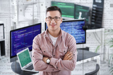 Portrait of male programmer in officeの写真素材