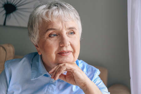 Portrait of elderly woman at homeの写真素材