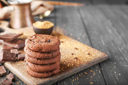 Tasty chocolate cookies on wooden tableの写真素材
