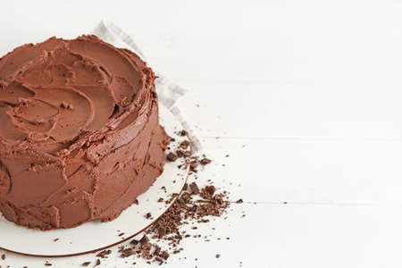 Tasty chocolate cake on white background