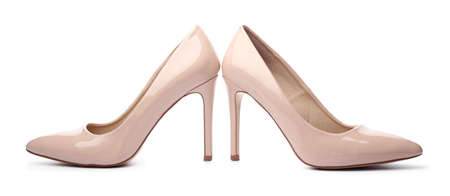 Stylish high-heeled female shoes on white backgroundの写真素材