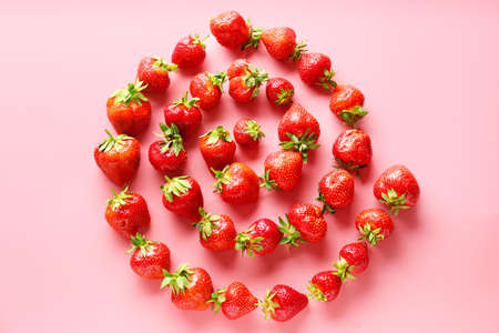 Ripe red strawberry on color background