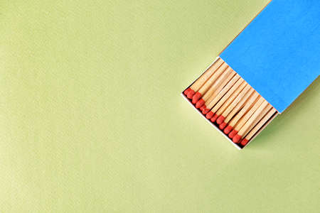 Box with matches on color backgroundの写真素材