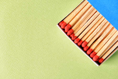 Box with matches on color backgroundの写真素材