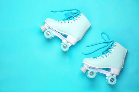 Vintage roller skates on color backgroundの写真素材
