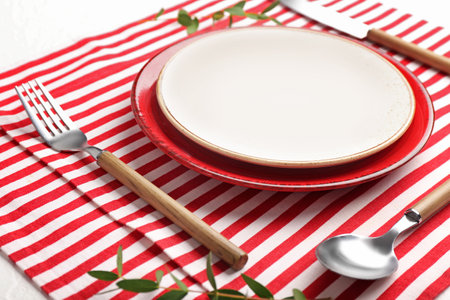 Beautiful table setting on white backgroundの写真素材