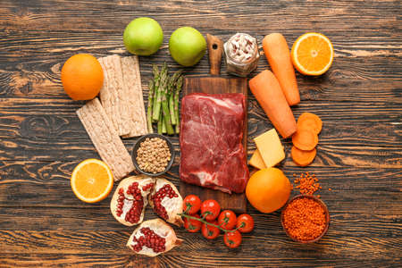 Different healthy food on wooden tableの写真素材