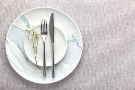 Simple table setting on gray background