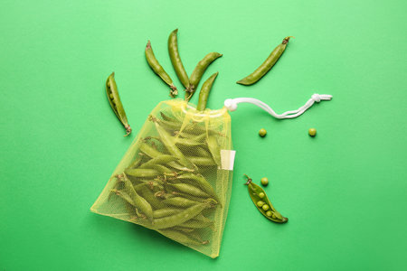 Eco bag with peas on color backgroundの写真素材