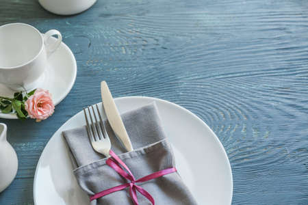 Simple table setting on wooden backgroundの写真素材