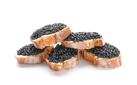 Sandwiches with black caviar on white backgroundの写真素材