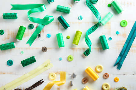 Set of sewing threads and accessories on light backgroundの写真素材