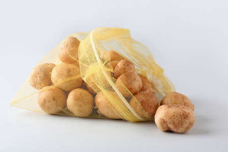 Eco bag with potato on light backgroundの写真素材
