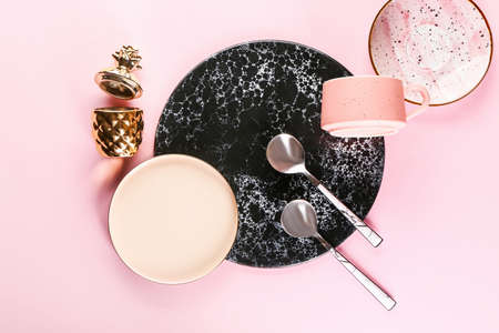 Different tableware on color backgroundの写真素材