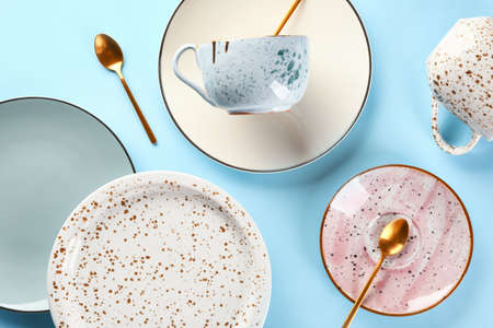 Different tableware on color backgroundの写真素材