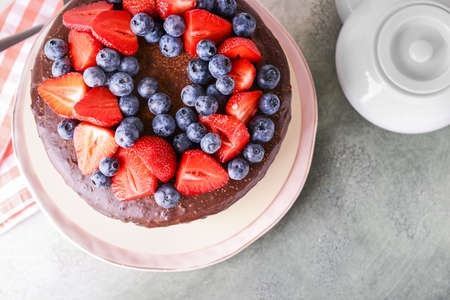 Tasty chocolate cake on gray tableの写真素材