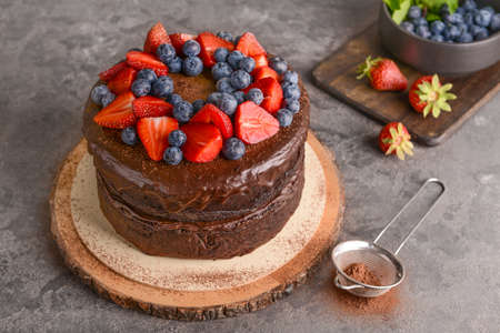 Tasty chocolate cake on gray tableの写真素材