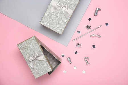 Beautiful gift boxes on color background
