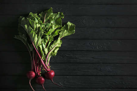 Fresh beet on dark wooden backgroundの写真素材