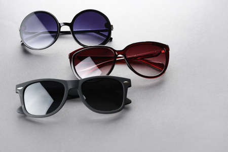 Modern sunglasses on gray backgroundの写真素材