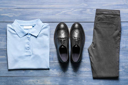 School uniform on wooden backgroundの写真素材