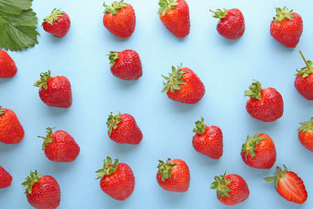 Sweet ripe strawberry on color background