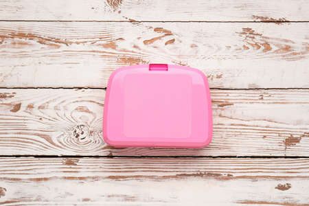 Plastic lunch box on wooden backgroundの写真素材
