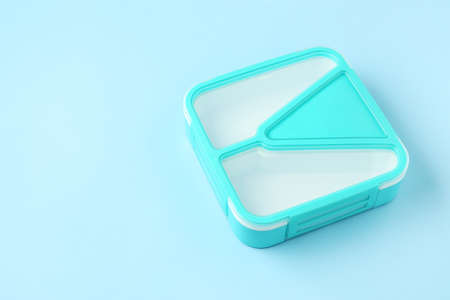 Plastic lunch box on color backgroundの写真素材
