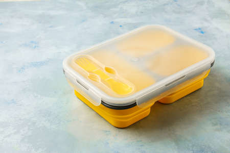 Plastic lunch box on light backgroundの写真素材